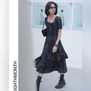 Black midi dress Asymmetrical ruffled hem
